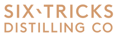 Six-Tricks Distilling Co. logo